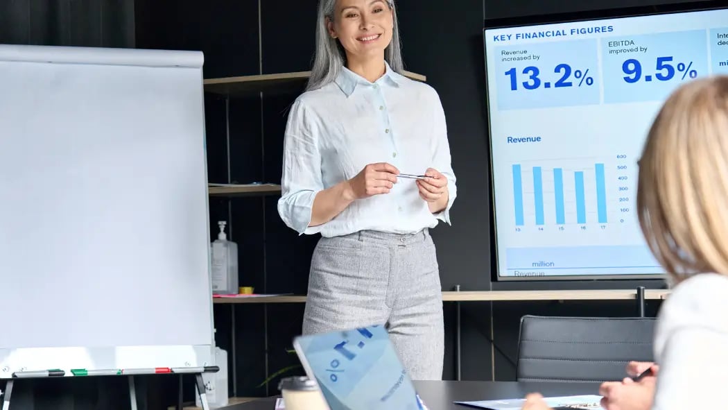 Woman giving a presentation that involves data