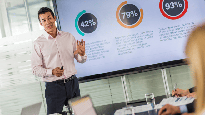 Man presenting data in meeting