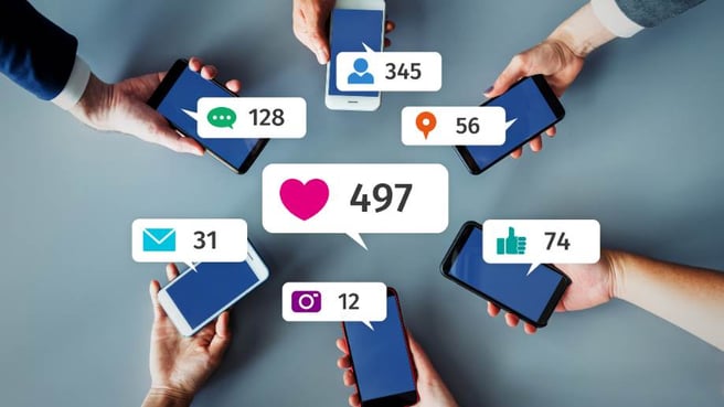 Phones showing different social media platforms