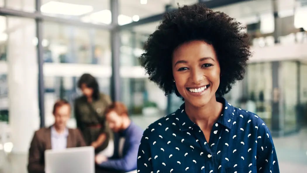 A woman smiling at work