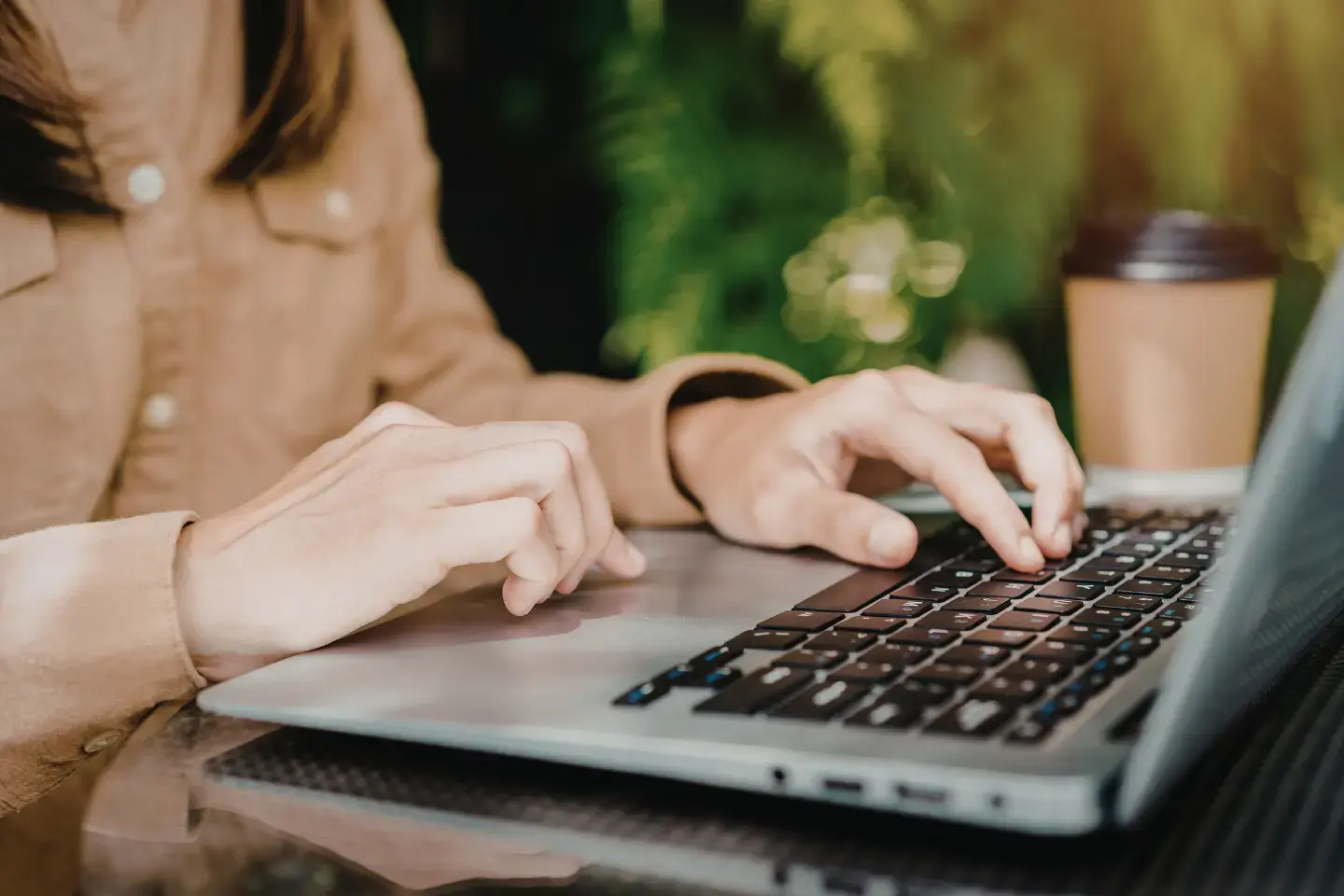 Professional working on laptop doing AI Leader Apprenticeship Unit Programme