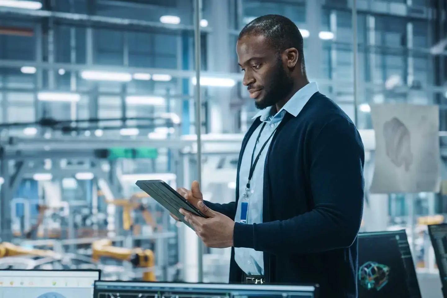 Professional data engineer apprentice working on a tablet.